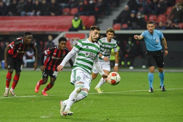 Celtic's Croatian defender Josip Juranovic clips a panenka penalty and equalise against Bayer Leverkusen. (Photo by Ina Fassbender / AFP) (Photo by INA FASSBENDER/AFP via Getty Images)