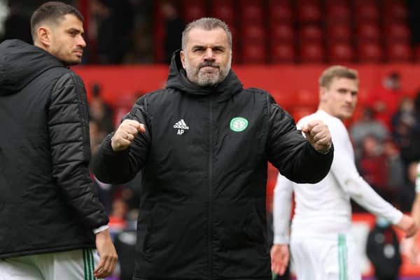 Celtic manager Ange Postecoglou celebrates with a fist pump towards the away support at full-time (Photo by Alan Harvey / SNS Group)