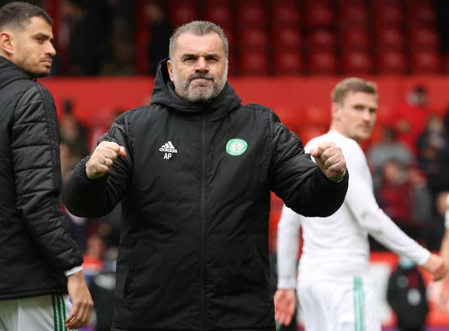 Celtic manager Ange Postecoglou celebrates with a fist pump towards the away support at full-time (Photo by Alan Harvey / SNS Group)