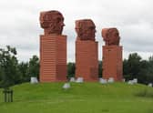 The Big Heids sculpture is made up of three giant heads, each 33ft high and weighing 18 tons. 