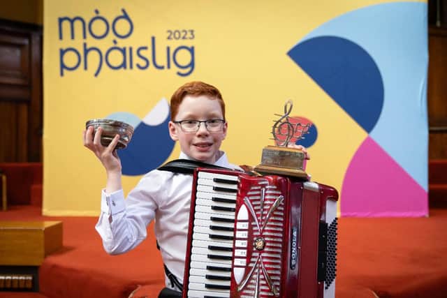 Forth Primary P7 pupil Alistair Adamson (11) won two trophies at the  Mòd, taking the U13 accordion and piano trophies.