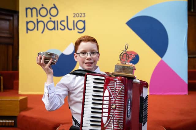 Forth Primary P7 pupil Alistair Adamson (11) won two trophies at the Mòd, taking the U13 accordion and piano trophies.