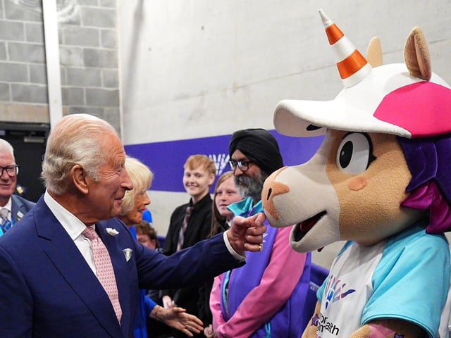 King Charles meets Finnie, the 2026 Commonwealth Games unicorn mascot, during a reception ahead of the opening ceremony of the 23rd Commonwealth Games
