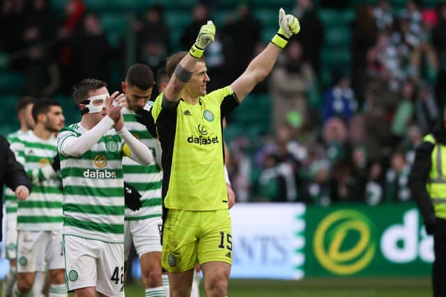 Celtic's Joe Hart and club captain Callum McGregor salute their support at full-time after a late winner in a 3-2 success over Dundee on Sunday allowed them to open up a three-point gap over Rangers in the title race. (Photo by Craig Williamson / SNS Group)