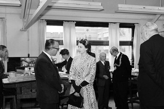 Queen Elizabeth II being shown round Templetons Carpet Factory during her 1964 Glasgow visit