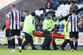 Jamie McGrath is taken from the field on a stretcher after suffering an injury during St Mirren's 2-1 defeat at home to Rangers. (Photo by Craig Williamson / SNS Group)
