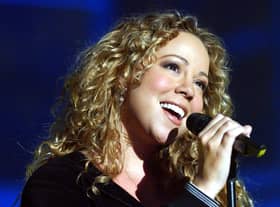 Guest star Mariah Carey performing during the fifth round of expulsions from BBC's Fame Academy at Shepperton Studios in west London.  * 1/12/02: Pop diva Mariah Carey who has pledged in an interview with The Sunday Mirror Magazine, to "live life" and "enjoy" herself following a tough year in her professional and private life. The US star, who received a multi-million pay off from EMI, earlier this year after her album Glitter bombed, made the promise near the end of the year in which she was hosptalised for exhaustion and lost her father. 