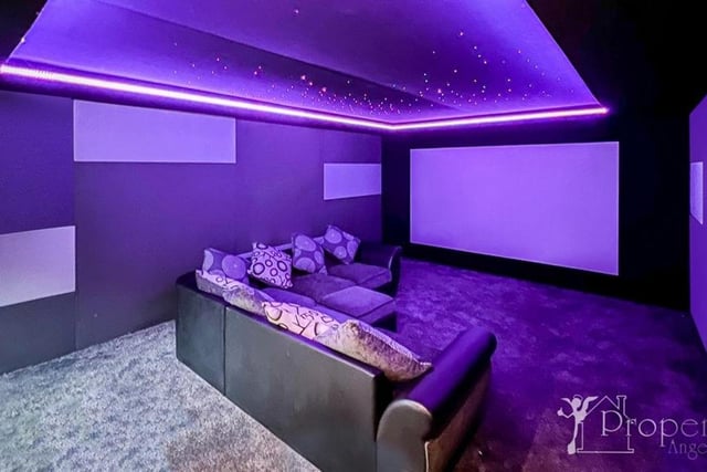 The garage was converted into a cinema room.