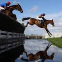 Derek Fox (r) riding Corach Rambler takes the water jump on his way to winning  the Ultima Handicap Chase at the Cheltenham Festival 2023. Can he now win the Grand National? (Picture: Michael Steele/Getty Images)
