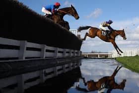 Derek Fox (r) riding Corach Rambler takes the water jump on his way to winning  the Ultima Handicap Chase at the Cheltenham Festival 2023. Can he now win the Grand National? (Picture: Michael Steele/Getty Images)