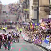 France's Benoit Cosnefroy leads a group of riders along George Square in Glasgow during day four of the 2023 UCI Cycling World Championships in Glasgow. Image: Tim Goode/PA Wire.