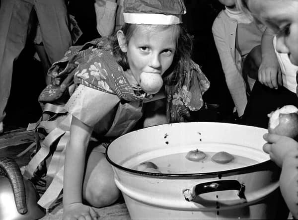 Elizabeth Watson dooking for apples in November 1971.