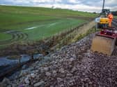 More than 300 tonnes of new stone has been used to stabilise the embankment.