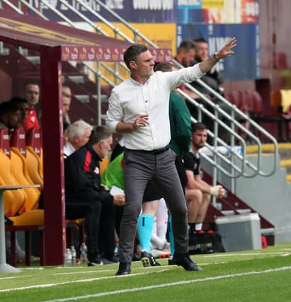 Graham Alexander watching his team suffer shock first leg defeat against Sligo (Pic by Ian McFadyen)