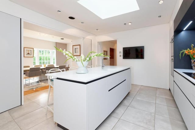 The house has two kitchens and dining rooms.
