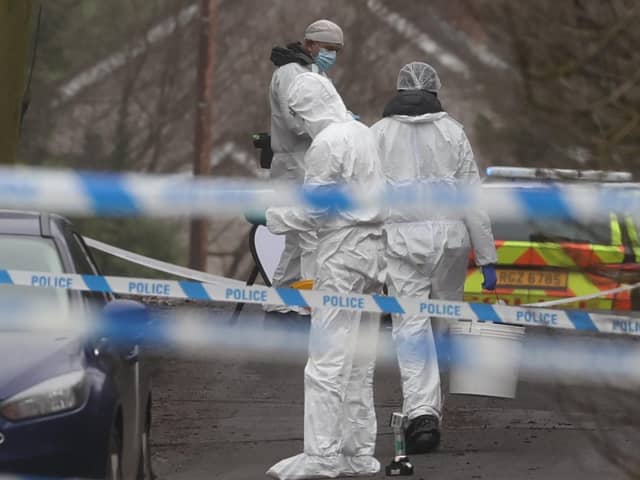 Forensic officers from Police Service of Northern Ireland (PSNI) at the sports complex in the Killyclogher Road area of Omagh