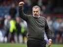 Celtic manager Ange Postecoglou reacts to the travelling support at full time.
