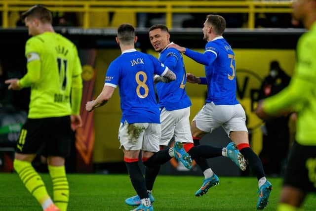 Rangers' English defender James Tavernier (C) celebrates scoring the opening goal in Dortmund on February 17, 2022. (Photo by SASCHA SCHUERMANN/AFP via Getty Images)