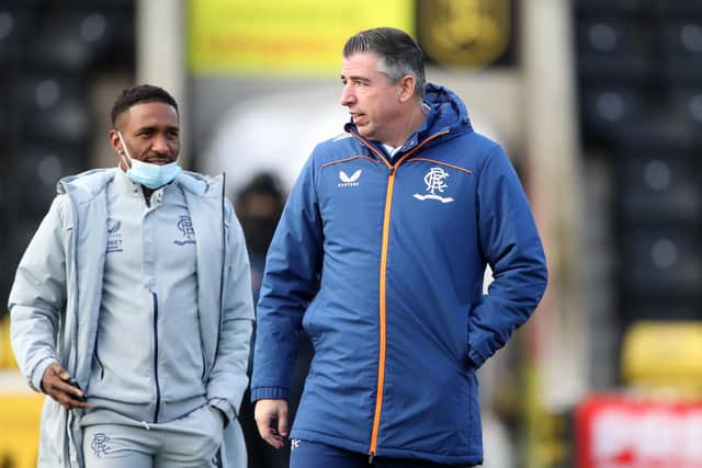 Jermain Defoe (left) and new Rangers first team coach Roy Makaay in conversation before Sunday's Premiership fixture at Livingston. (Photo by Ian MacNicol/Getty Images)