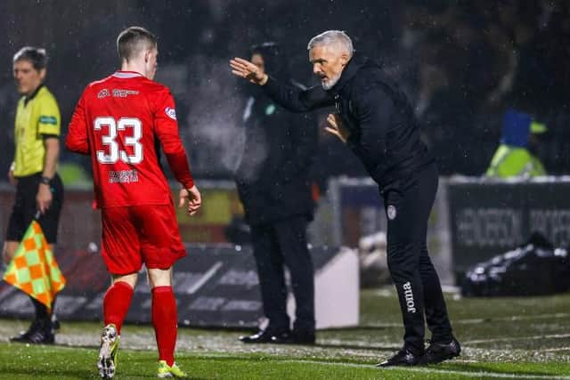 St Mirren manager Jim Goodwin gives instructions to debutant Kieran Offord during his team's Premiership match against Celtic in Paisley on Wednesday. (Photo by Craig Williamson / SNS Group)