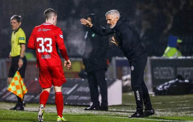 St Mirren manager Jim Goodwin gives instructions to debutant Kieran Offord during his team's Premiership match against Celtic in Paisley on Wednesday. (Photo by Craig Williamson / SNS Group)