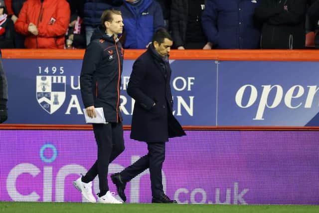 Rangers manager Giovanni van Bronckhorst walks back to the dressing room at the end of his team's 1-1 draw against Aberdeen at Pittodrie. (Photo by Craig Williamson / SNS Group)
