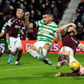 Celtic's Giorgios Giakoumakis scores to make it 2-0 against Hearts at Tynecastle. (Photo by Ross Parker / SNS Group)