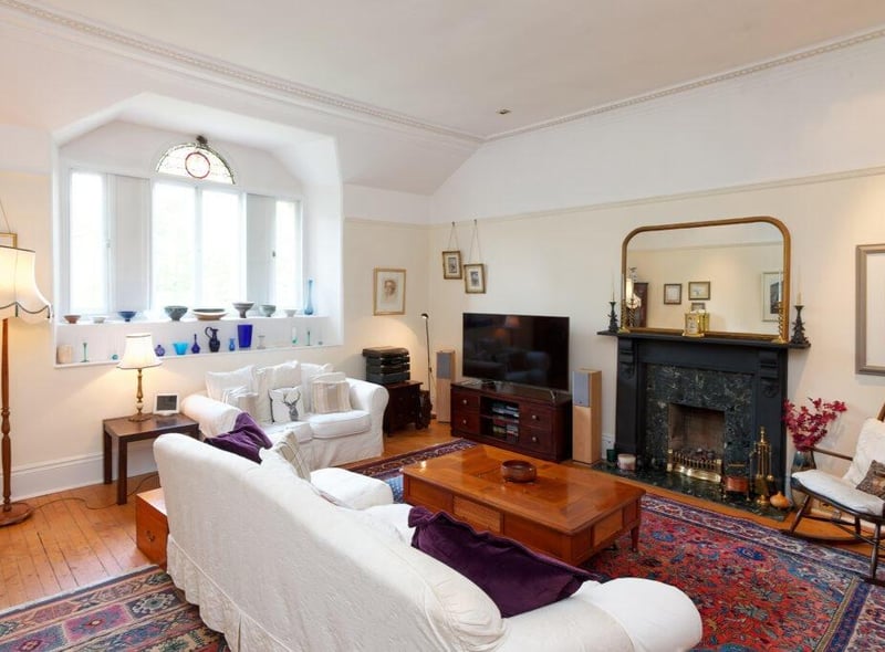 The lounge has a decorative fireplace.