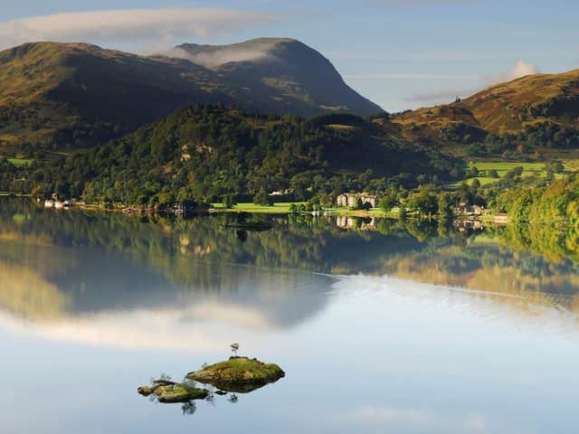 Lake Ullswater has crystal clear shingle waters flanked by every shade of green