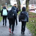 Pupils making their way to school. Picture: Michael Gillen