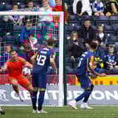 Brad Lyons opens the scoring for Kilmarnock against Rangers.