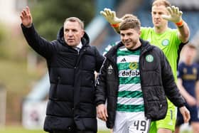 Brendan Rodgers with James Forrest at full time during a cinch Premiership match between Dundee and Celtic.