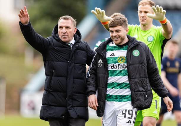 Brendan Rodgers with James Forrest at full time during a cinch Premiership match between Dundee and Celtic.