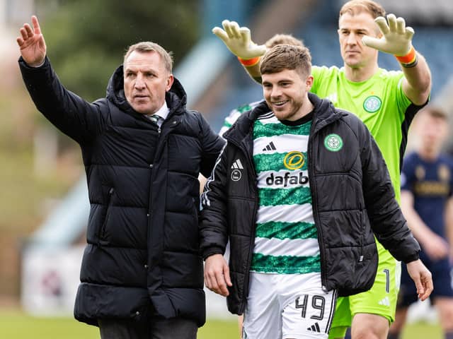 Brendan Rodgers with James Forrest at full time during a cinch Premiership match between Dundee and Celtic.