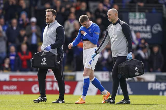 Rangers' John Lundstram goes off injured during the cinch Premiership match at The SMISA Stadium.