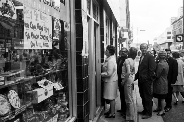 Glasgow shoppers queue at an Argyle Street grocery for sugar, available after the shortage of August 1974.