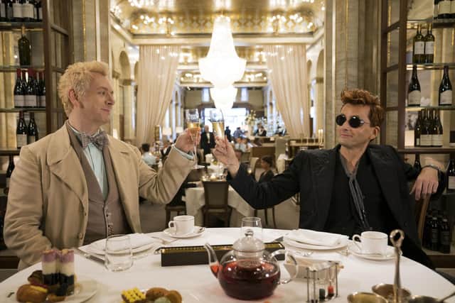 Good Omens Season 1 saw Tennant's Crowley and Sheen's Aziraphale celebrate saving Earth over champagne at the Ritz. Photo: Amazon Prime Video/PA Wire.