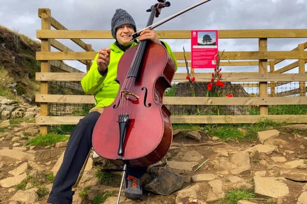 Riccardo Pes performing at The Sycamore Gap