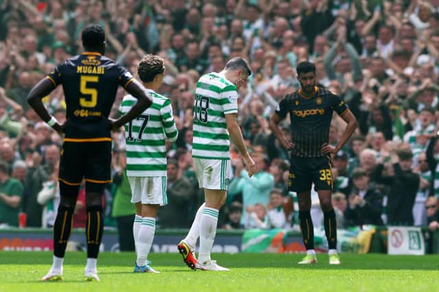 With Bevis Mugabi and Victor Nirennold looking on, Rogic leaves field after final Celtic appearance