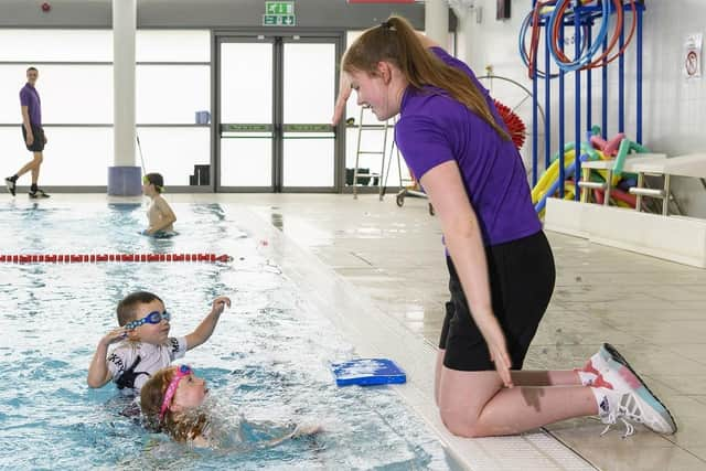 Cara Murray with one of the pupils.