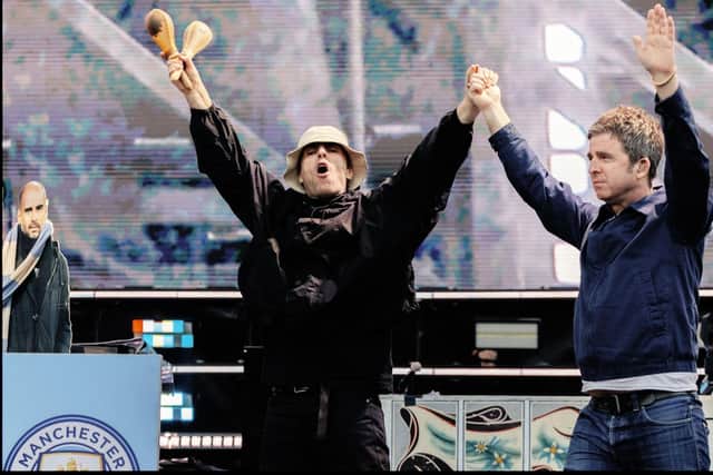 Brothers Liam and Noel Gallagher at Edinburgh’s Murrayfield Stadium during one of three Oasis gigs in 2025.