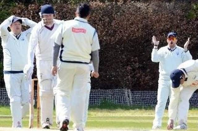 Bryan Clarke (first left) and his team suffered defeat on Saturday