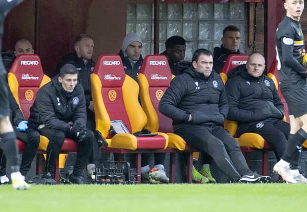 Tony Watt, centre, was a substitute amid reports he was on the verge of joining Dundee United