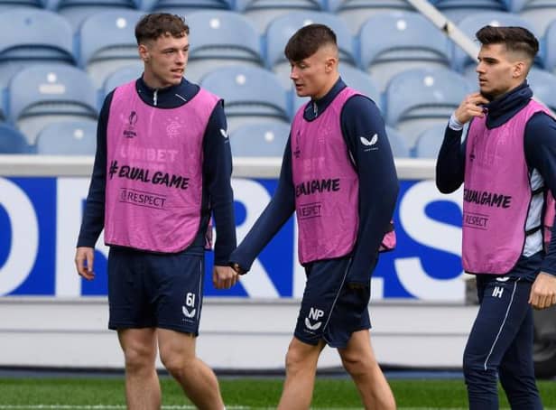 <p>Rangers defender Leon King (left) training alongside Nathan Patterson and Ianis Hagi (right) ahead of a Europa League tie last season. King made two substitute appearances for Steven Gerrard's team during the 2020-21 campaign. (Photo by Alan Harvey / SNS Group)</p>