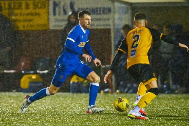 Aaron Ramsey is challenged by Annan Athletic's Charlie Barnes during his first starting appearance for Rangers. (Photo by Rob Casey / SNS Group)