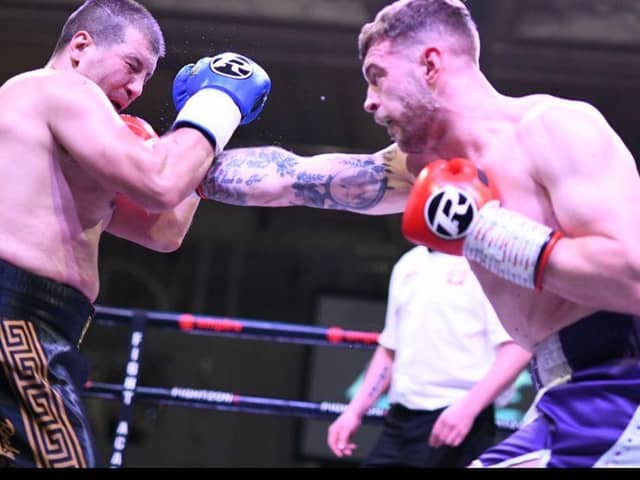 Michael McGurk lands a punch during Friday night's win (Pic by Jim Diamond/Kynoch Boxing)