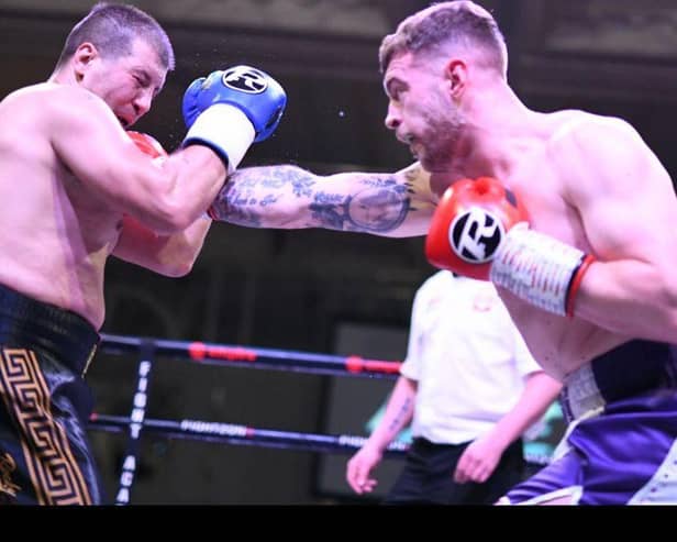 Michael McGurk lands a punch during Friday night's win (Pic by Jim Diamond/Kynoch Boxing)