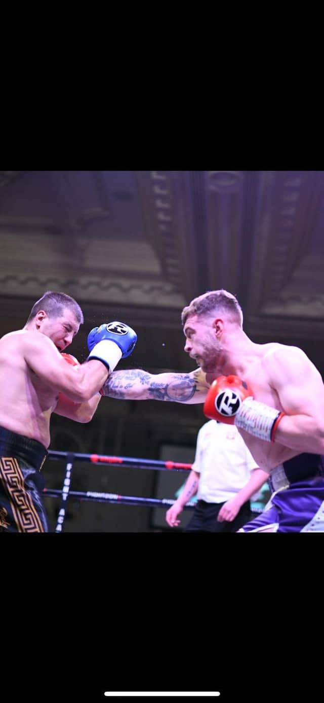 Michael McGurk lands a punch during Friday night's win (Pic by Jim Diamond/Kynoch Boxing)