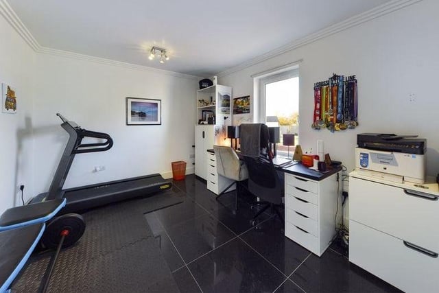 Whether you choose to use this room as a gym or office, it offers plenty of scope for both.