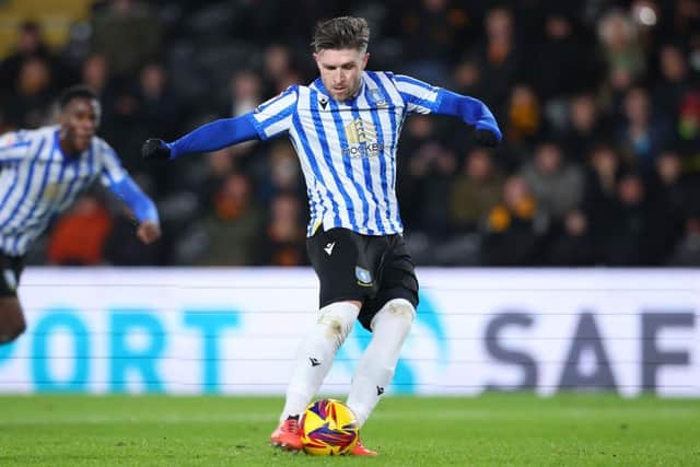 ON THEIR WAY: Josh Windass converts a rare Sheffield Wednesday penalty